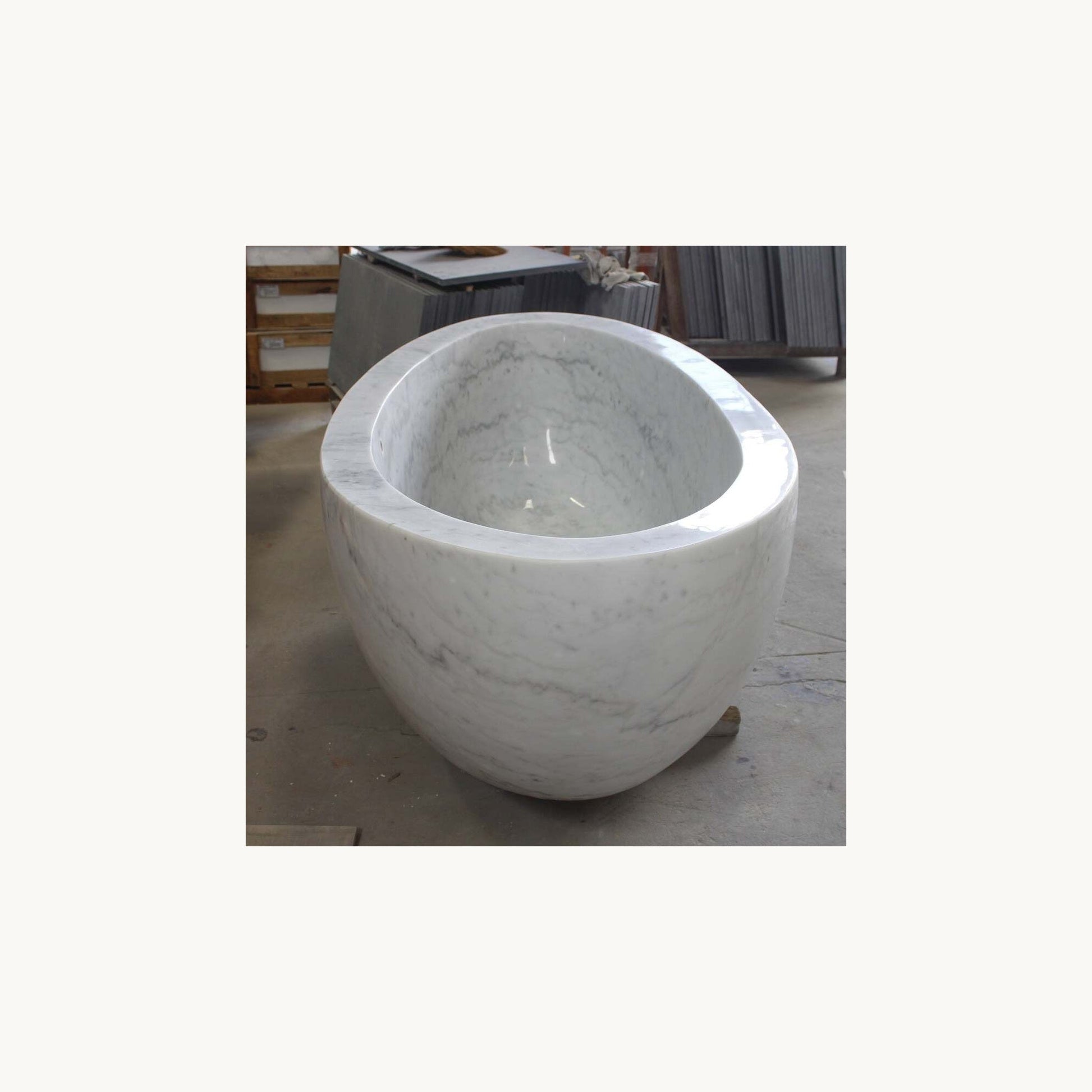 Avela BT-112A Ivory Cloud Marble bathtub, real end workshop view