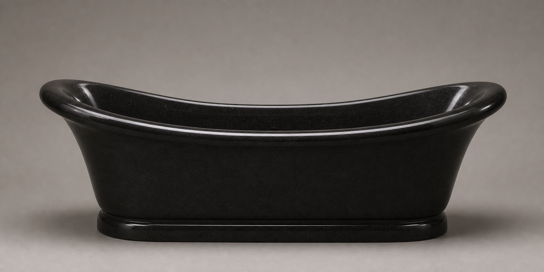 Vallora elongated Shanxi Black Granite bathtub with rolled rim, side profile