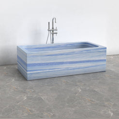Virelle Azura Blue Quartzite rectangular soaking bathtub, exact-source side and material-facing view showing straight exterior profile and stone banding