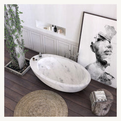 Yaris freestanding Carrara White Marble bathtub, opposite angled view
