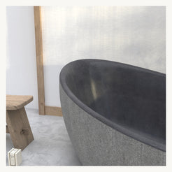 Yuka Absolute Black Granite bathtub material texture and finish, studio detail visualization