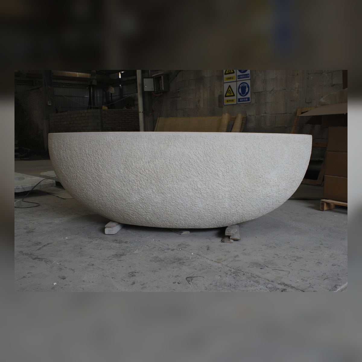 Evania Crema Marfil Extra Marble bathtub, real finished front workshop view