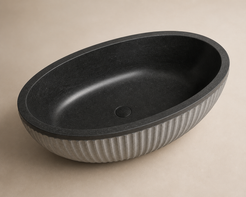 Rivelle fluted black granite bathtub with polished interior and center drain, top view