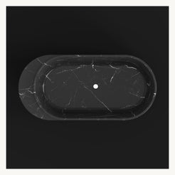 Yetta Portoro Black Marble bathtub, studio top view with drain and asymmetrical rim