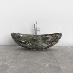 Yuna Celestia Blue Quartzite bathtub, exact-source front view showing raised rim and mineral pattern