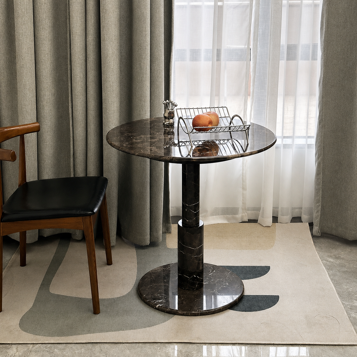 RoundTwin Elite dark Emperador marble dining table in boutique dining room setting