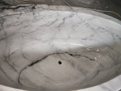 Actual Aurelia BT-038A marble bathtub polished interior, natural veining, and drain detail