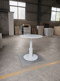 RoundTwin Elite Carrara white marble dining table shown in workshop before final packing