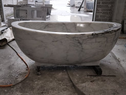 Actual Aurelia BT-038A solid marble pedestal bathtub, end view