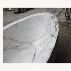Celeste Ivory Cloud Marble bathtub, real gray veining and thick rounded rim detail