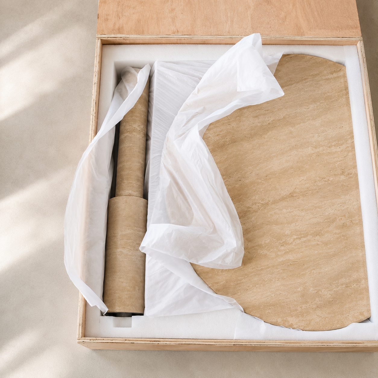RoundTwin Elite travertine dining table components wrapped for safe delivery