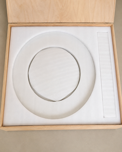 RoundTwin Elite Carrara white marble dining table packed for safe shipping