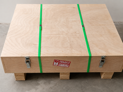 RoundTwin Elite Carrara white marble dining table packed by wooden crate.