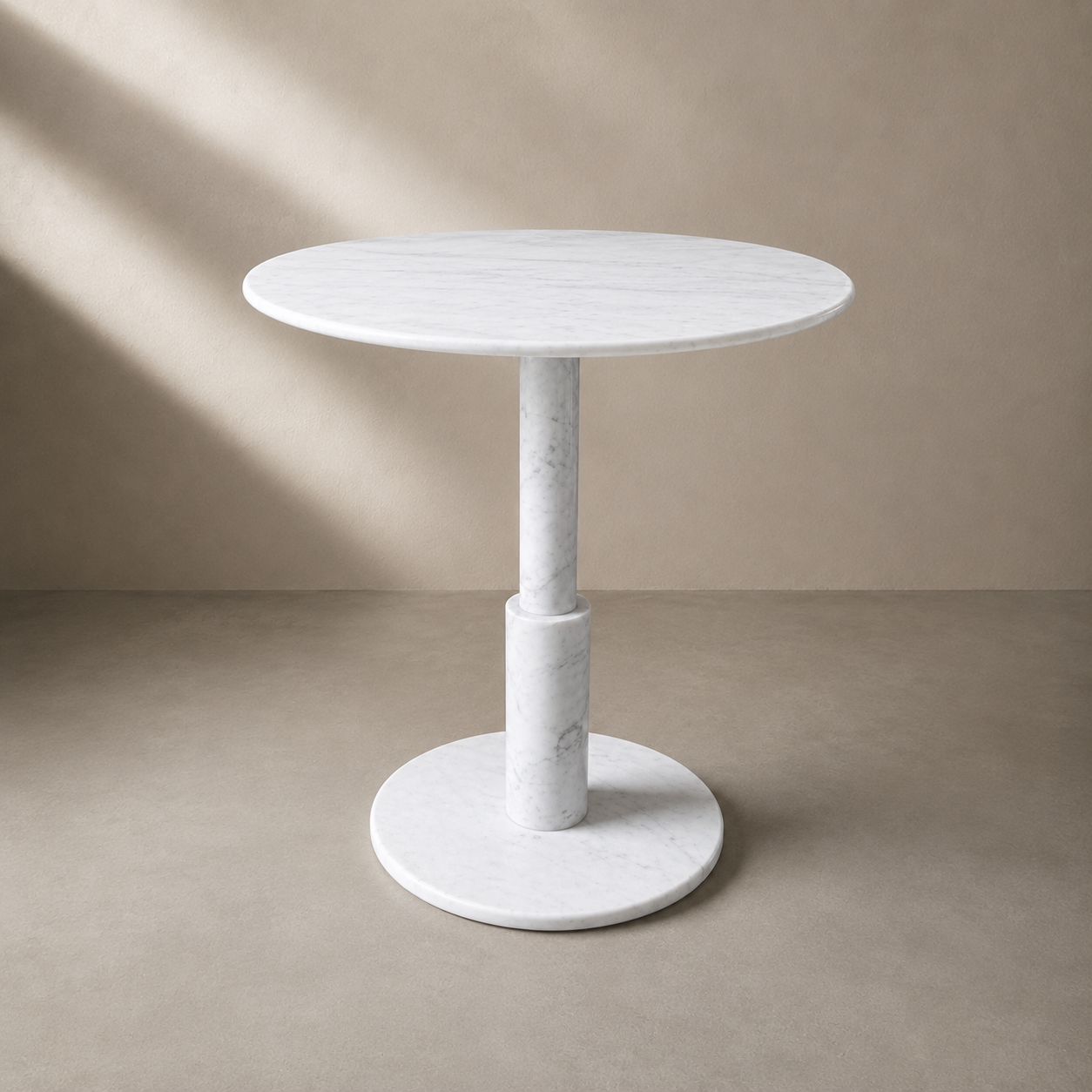 RoundTwin Elite Carrara white marble dining table front view with compact round stone tabletop
