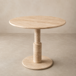 RoundTwin Elite travertine dining table angled view showing round tabletop and pedestal base