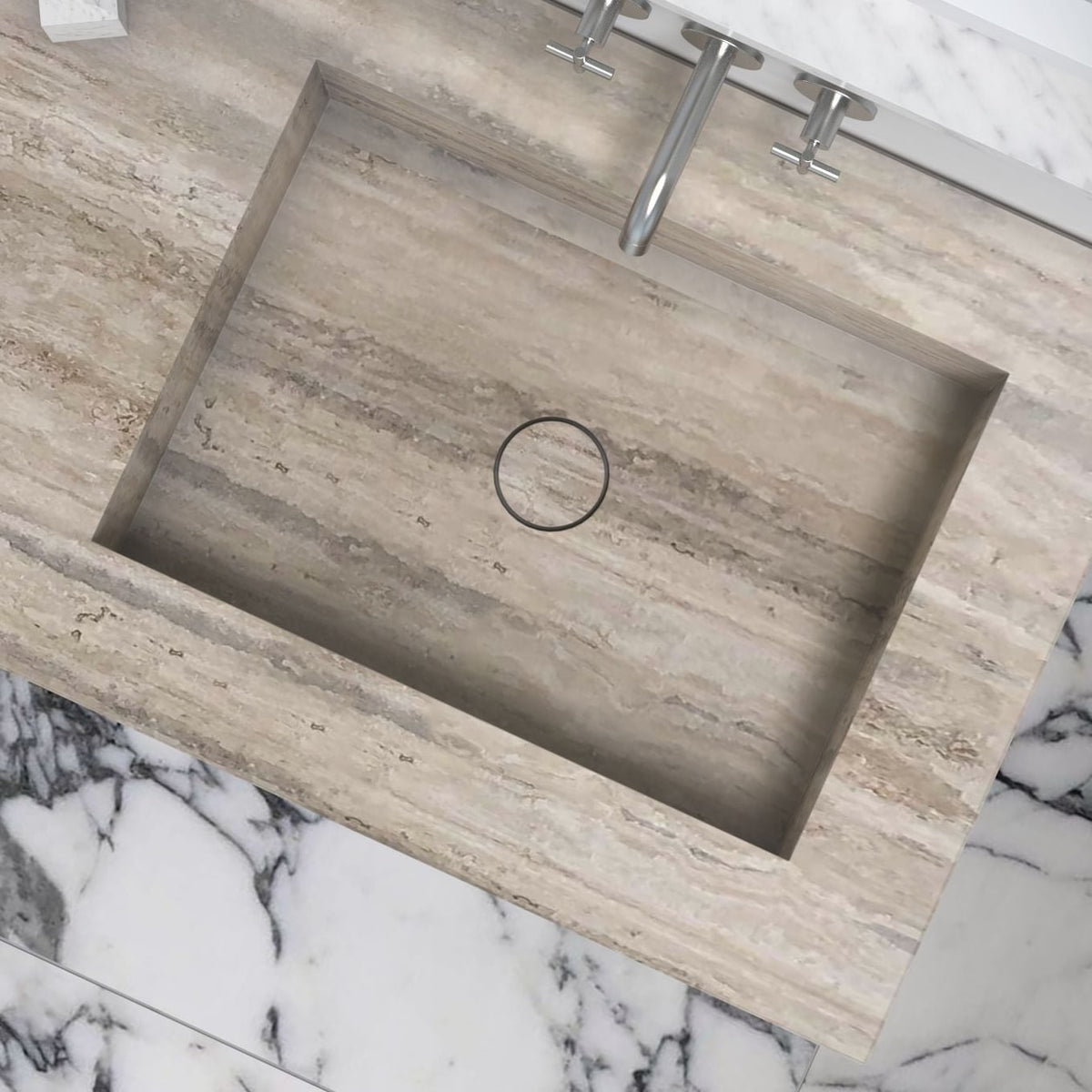 Top view of the Talia travertine integrated sink showing its rectangular basin and drain