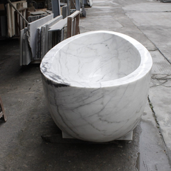 Celeste Ivory Cloud Marble soaking bathtub, real end view and sculptural bowl profile