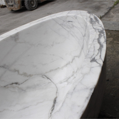 Celeste Ivory Cloud Marble bathtub, real gray veining and thick rounded rim detail