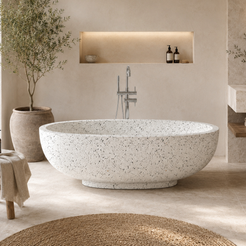 Selvara BT-134A alba-white-terrazzo freestanding soaking bathtub in a soft natural-light spa and wellness bathroom