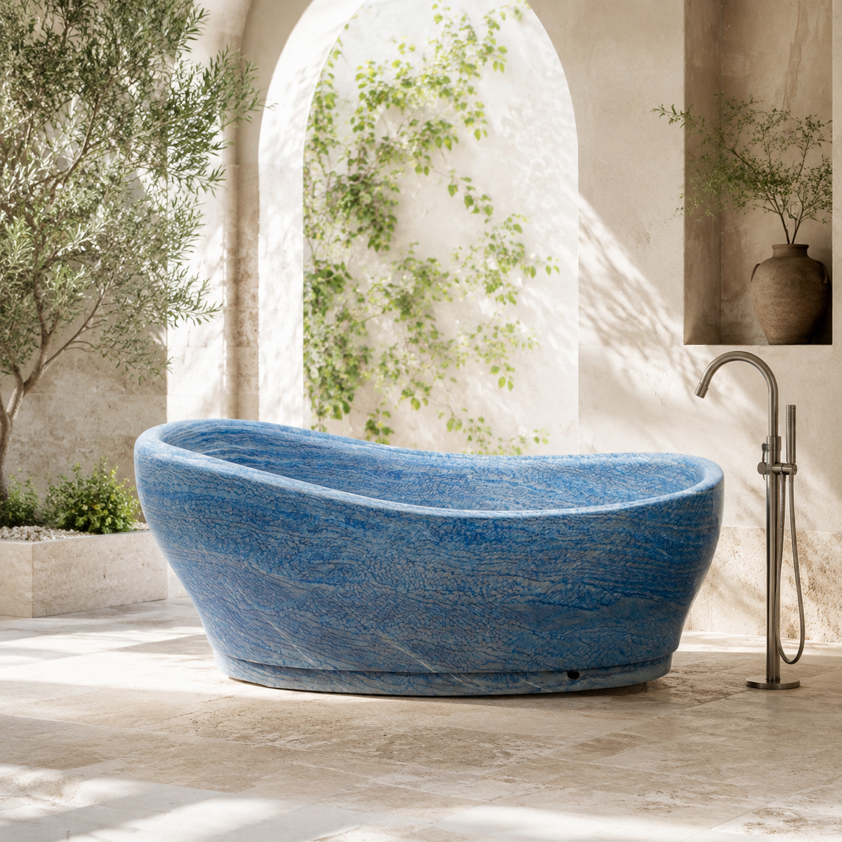 Azzara Sculptural Oval Freestanding Soaking Bathtub – Azura Blue Quartzite in a bright serene courtyard spa bathroom; exact product geometry and material preserved