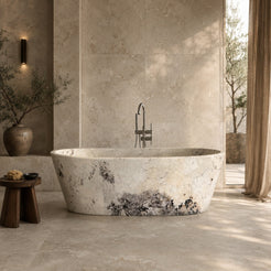 Calia BT-014A Pandora Blanc Quartzite freestanding soaking bathtub in a warm luxury architectural bathroom, styled visualization