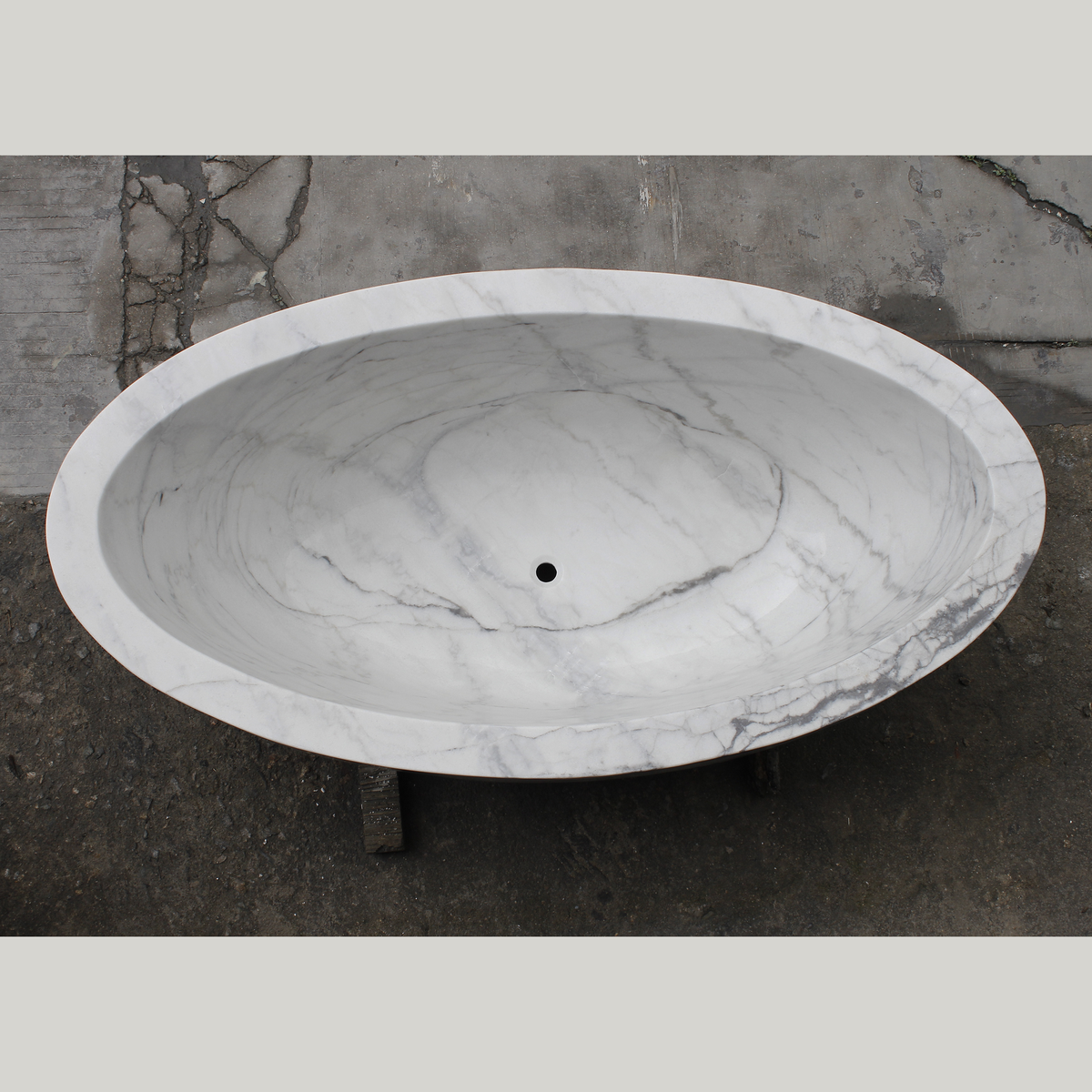 Celeste Ivory Cloud Marble soaking bathtub, real top view showing deep oval interior