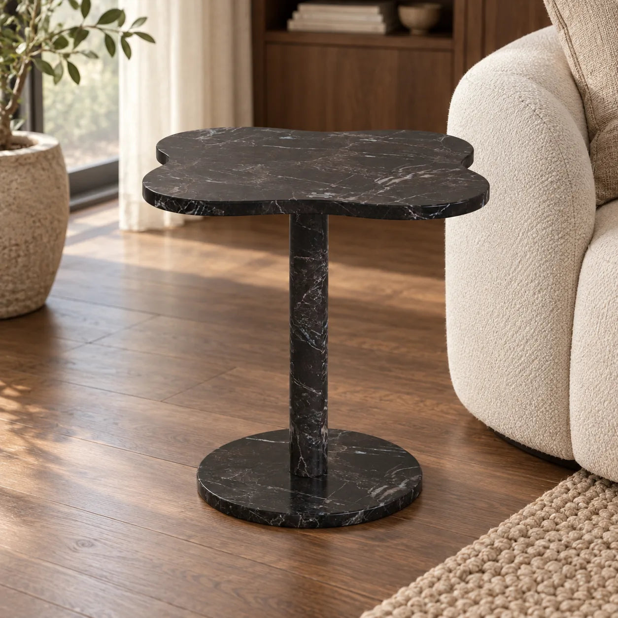 LakeMist Dark Emperador marble side table beside a cream sofa, shown from a moderate oblique view