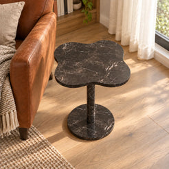 LakeMist Dark Emperador marble side table in a window reading corner, shown from an elevated oblique view