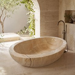 Lysara Low-Profile Oval Freestanding Soaking Bathtub – Natural Sandstone in a bright serene courtyard spa bathroom; exact product geometry and material preserved