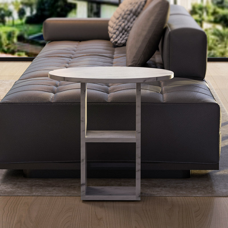 Marble Nook Side Table beside a sofa in modern living room