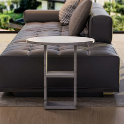 Marble Nook Side Table beside a sofa in modern living room