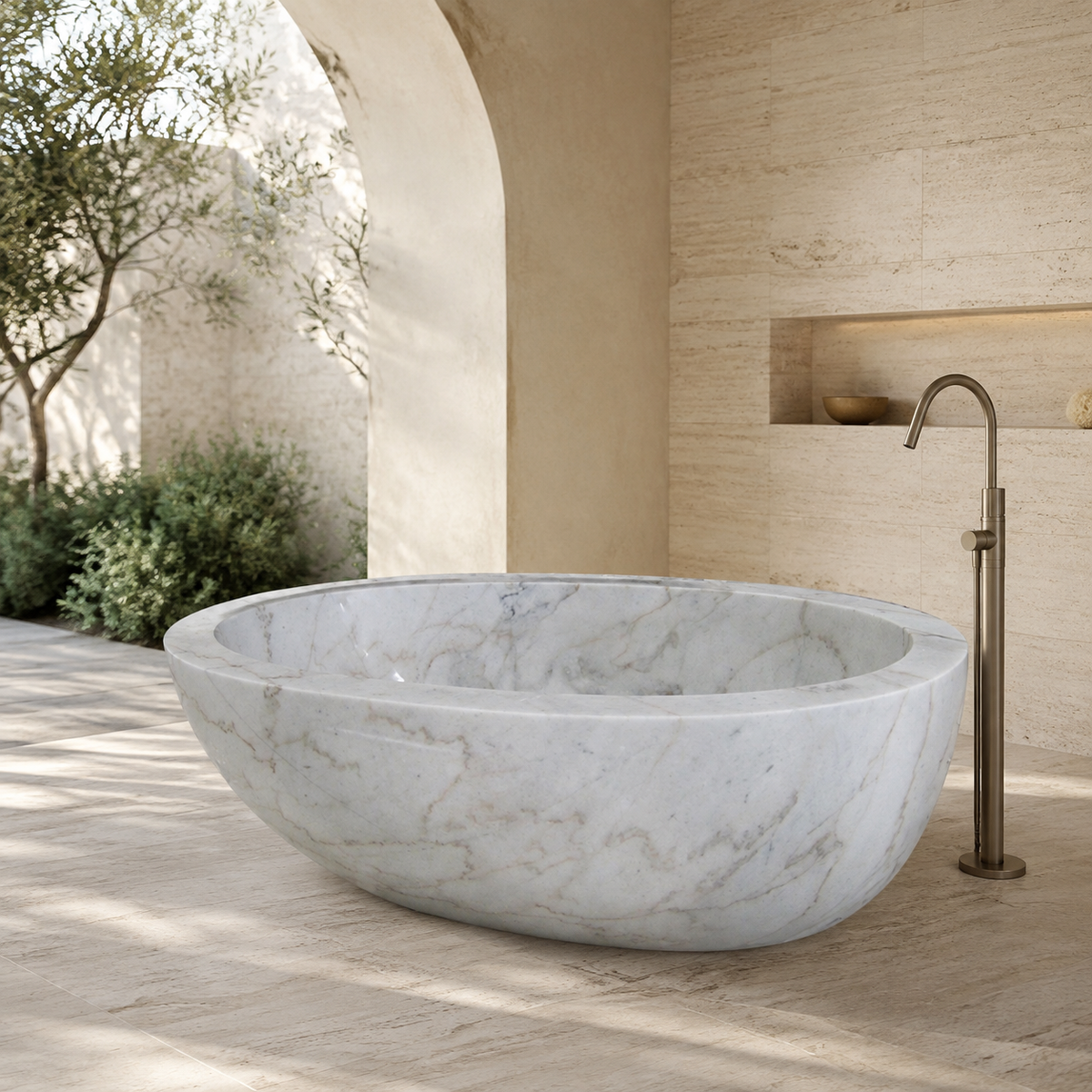 Marella Oval Freestanding Soaking Bathtub – Ivory Cloud Marble in a bright serene courtyard spa bathroom; exact product geometry and material preserved