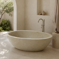 Mavelle Rounded-Rectangle Freestanding Soaking Bathtub – Spanish Crema Marfil Marble in a bright serene courtyard spa bathroom; exact product geometry and material preserved