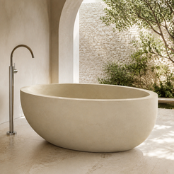 Navira Raised-End Oval Freestanding Soaking Bathtub – White Sand Beige Limestone in a bright serene courtyard spa bathroom; exact product geometry and material preserved