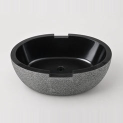 Noctira BT-061A Absolute Black Granite complete elevated interior studio visualization with centered drain and opposing rim notches