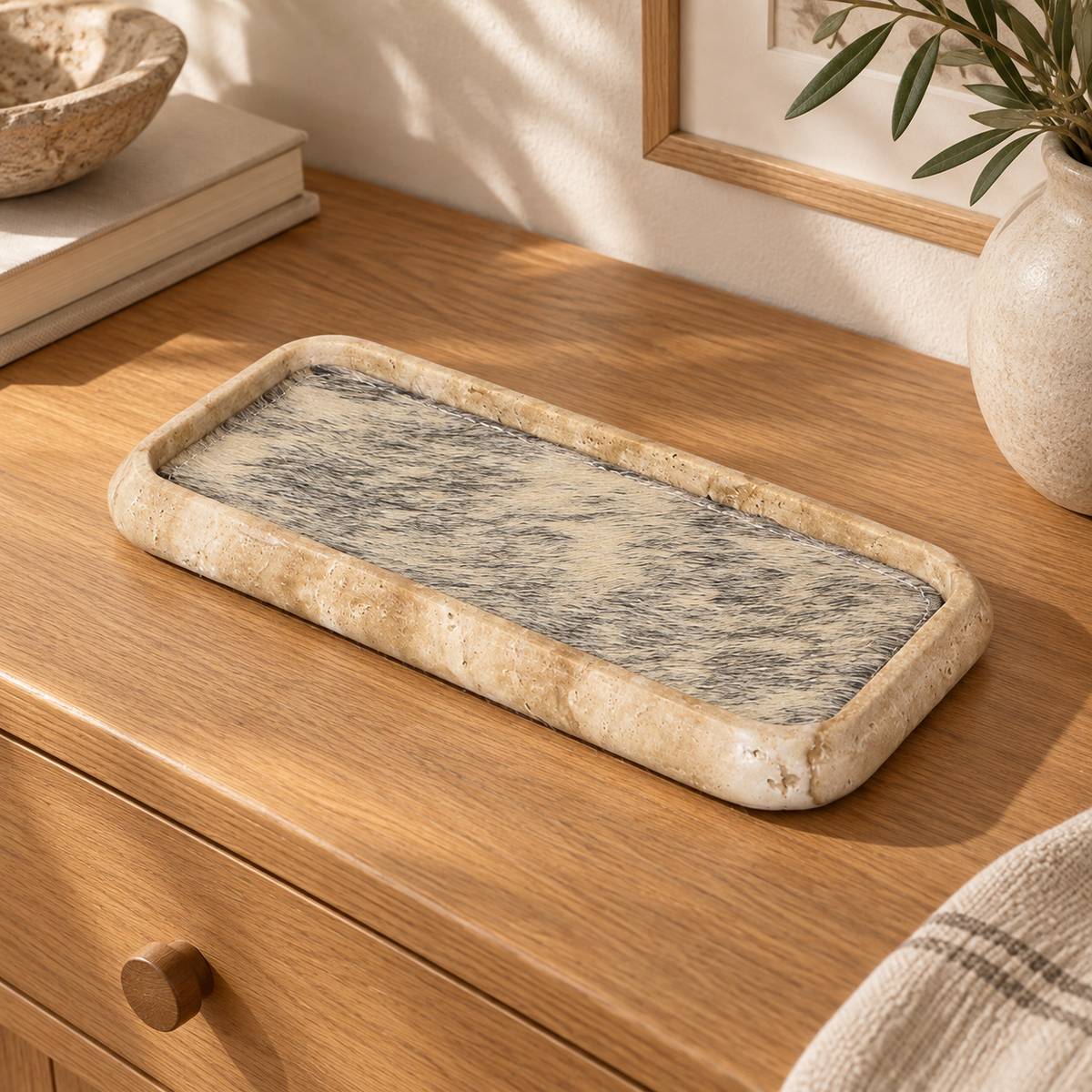 ZenFur beige travertine tray with horse-fur lining, elevated right three-quarter view