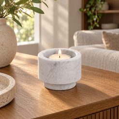 RoundHaven Candle Holders, Italian Carrara Marble, Short, single configuration in a warm naturally lit oak interior