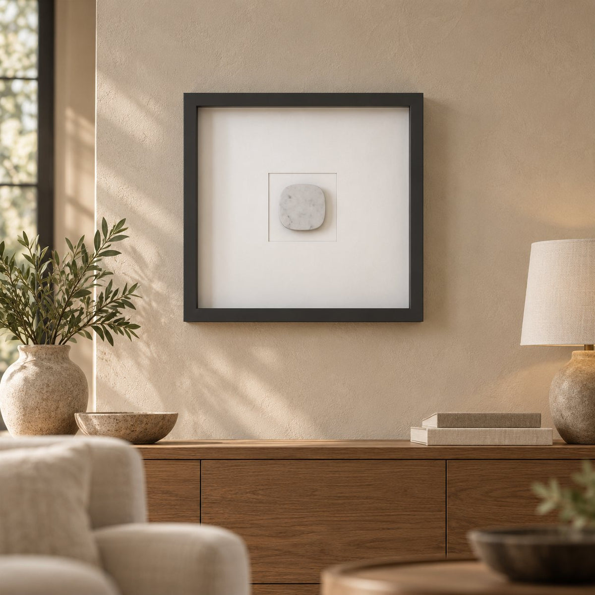 SquareSoft Italian Carrara marble wall frame decor, front view in a warm naturally lit interior