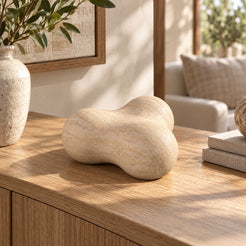 CloudDream Italian Classico travertine tabletop decor, oblique view in a warm naturally lit interior