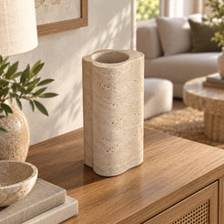 CloudDream Decorative Vases, Italian Classico Travertine, Second photograph camera moved to LEFT at 40 degrees and elevated25 degrees above horizontal; show differing lobe contour and the round inner opening., warm natural light lifestyle