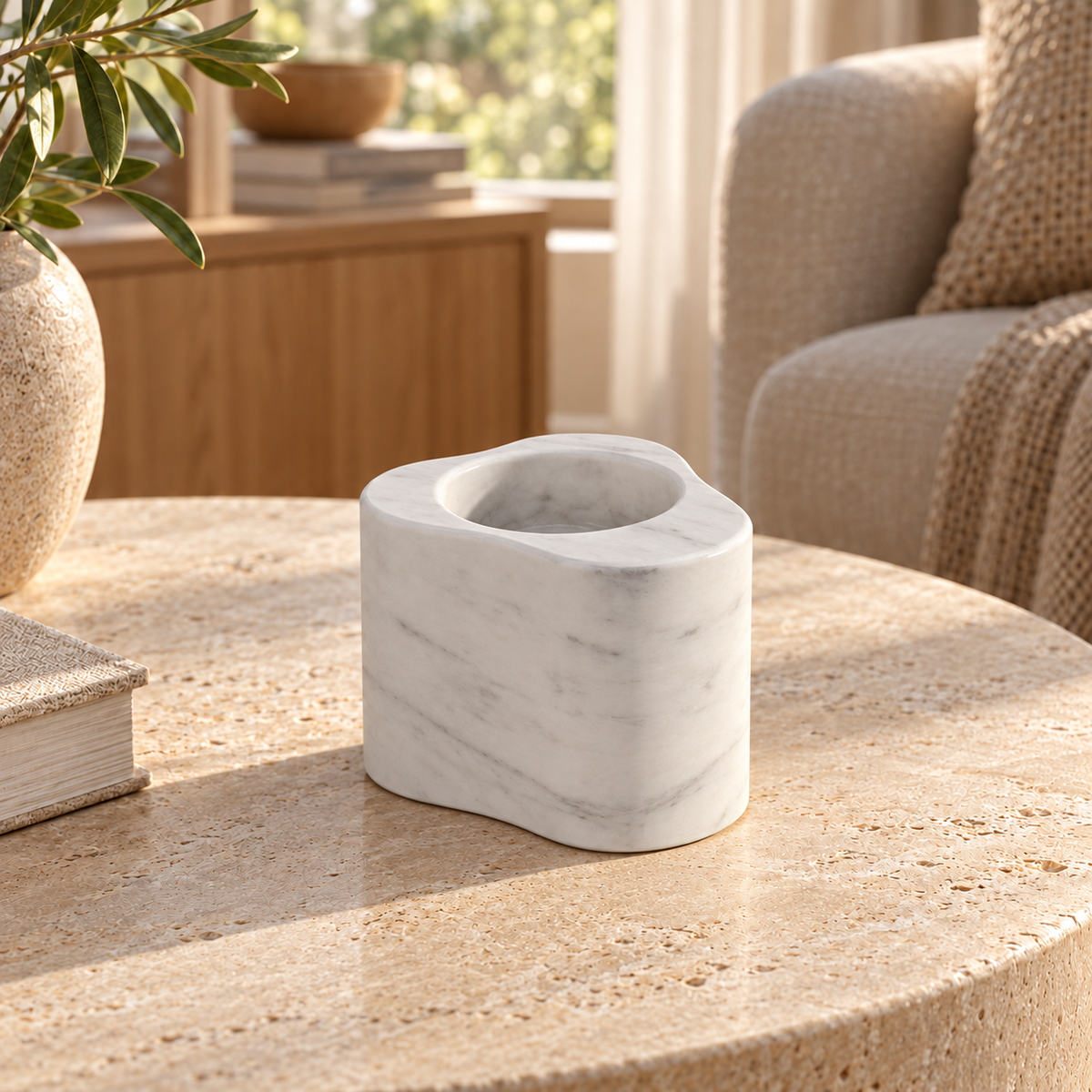 CloudDream Tall Carrara marble candle holder, front view in a warm natural-light interior