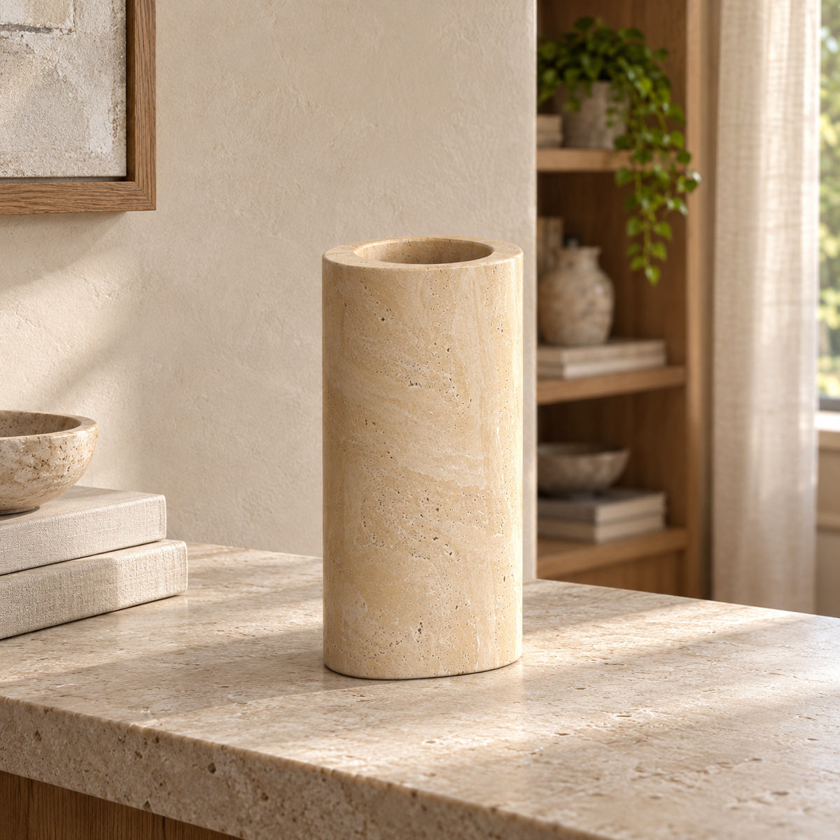 SwanEgg Decorative Vases, Italian Classico Travertine, single configuration, front view in a warm naturally lit interior
