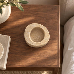 SwanEgg candle holder, Tall Italian Classico Travertine, one holder, overhead view in a warm naturally lit interior