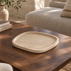 ZenPebble Decorative Tray, Italian Classico Travertine, single configuration, left oblique view in a warm naturally lit interior