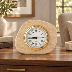 ZenPebble Marble Clock, Italian Classico Travertine, single configuration, front view in a warm naturally lit interior