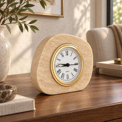 ZenPebble Marble Clock, Italian Classico Travertine, single configuration, left oblique view in a warm naturally lit interior