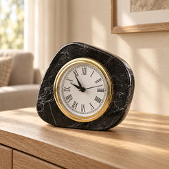 ZenPebble Marble Clock in Spanish Emperador Marble in warm natural home light, one complete product