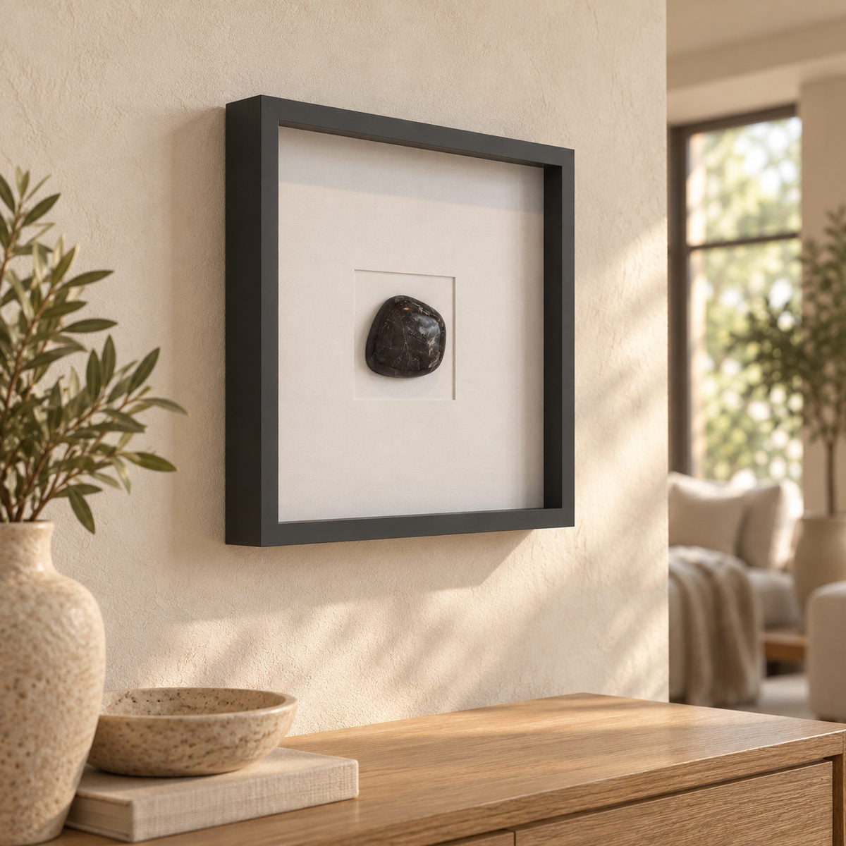 ZenPebble Wall Frame Decor, Spanish Emperador Marble, single configuration, left oblique view in a warm naturally lit interior