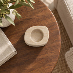 ZenPebble Candle Holders, Italian Classico Travertine / Short, single configuration, high or overhead view in a warm naturally lit interior