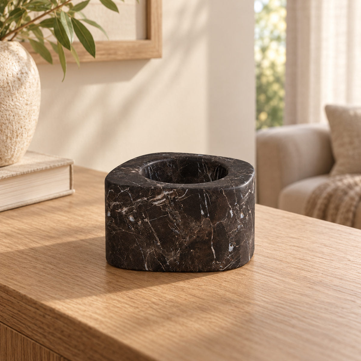 ZenPebble Candle Holders in Spanish Emperador Marble Short in warm natural home light, one complete product